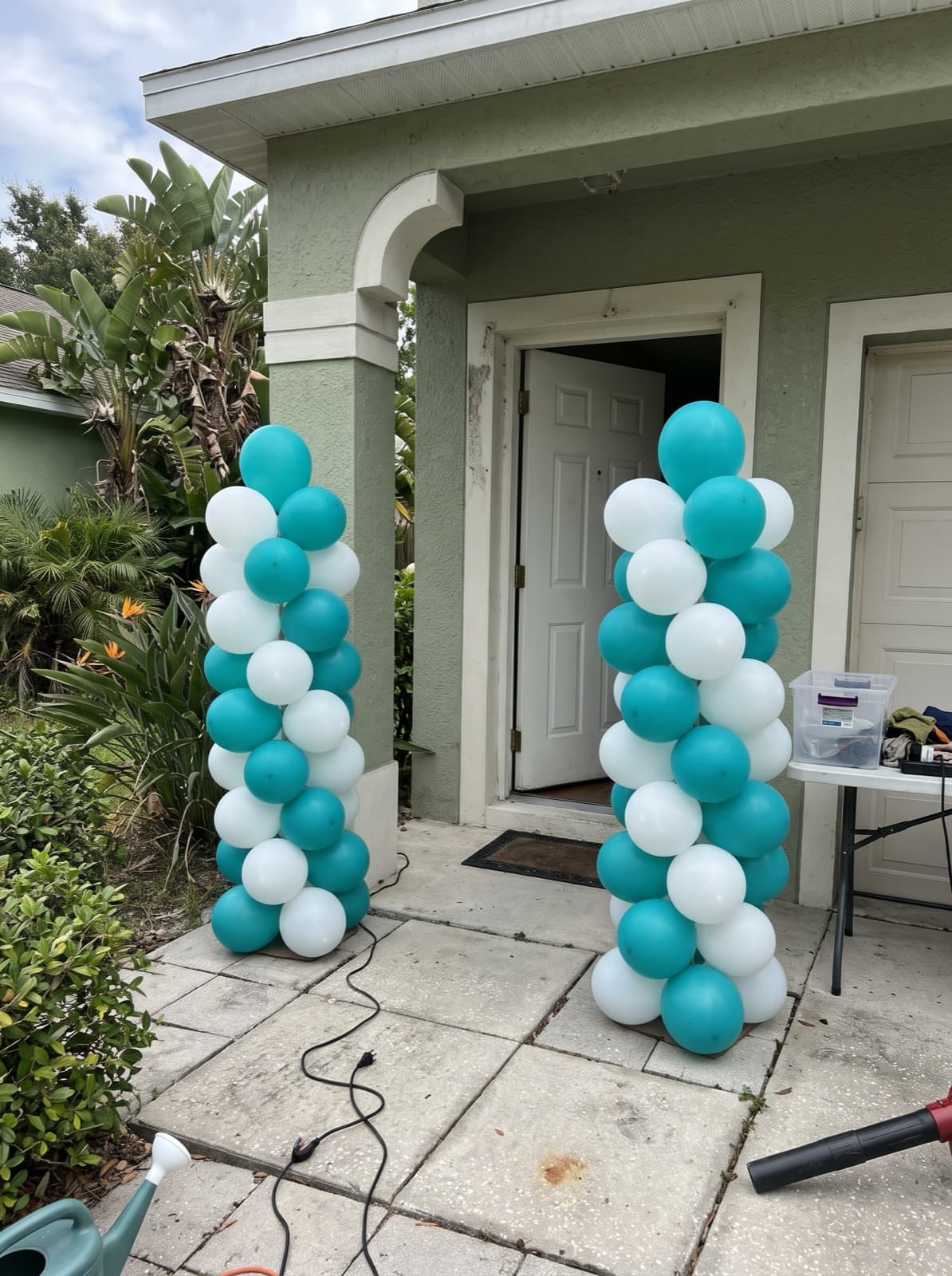 Pair of spiral balloon columns at a front door