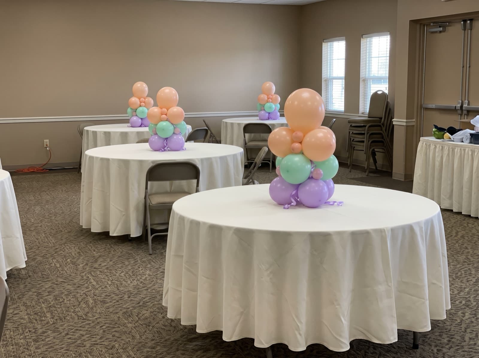 Mini tabletop balloon columns as banquet centerpieces