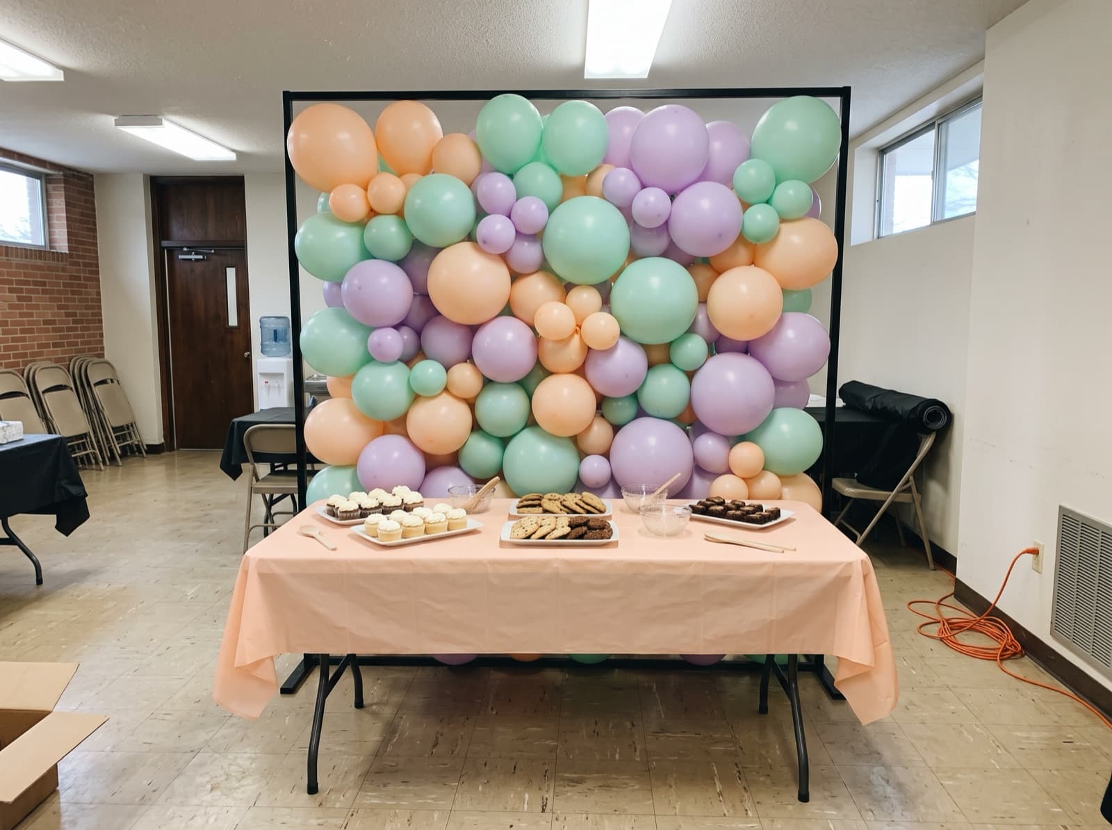 Square framed balloon wall in pastel colors