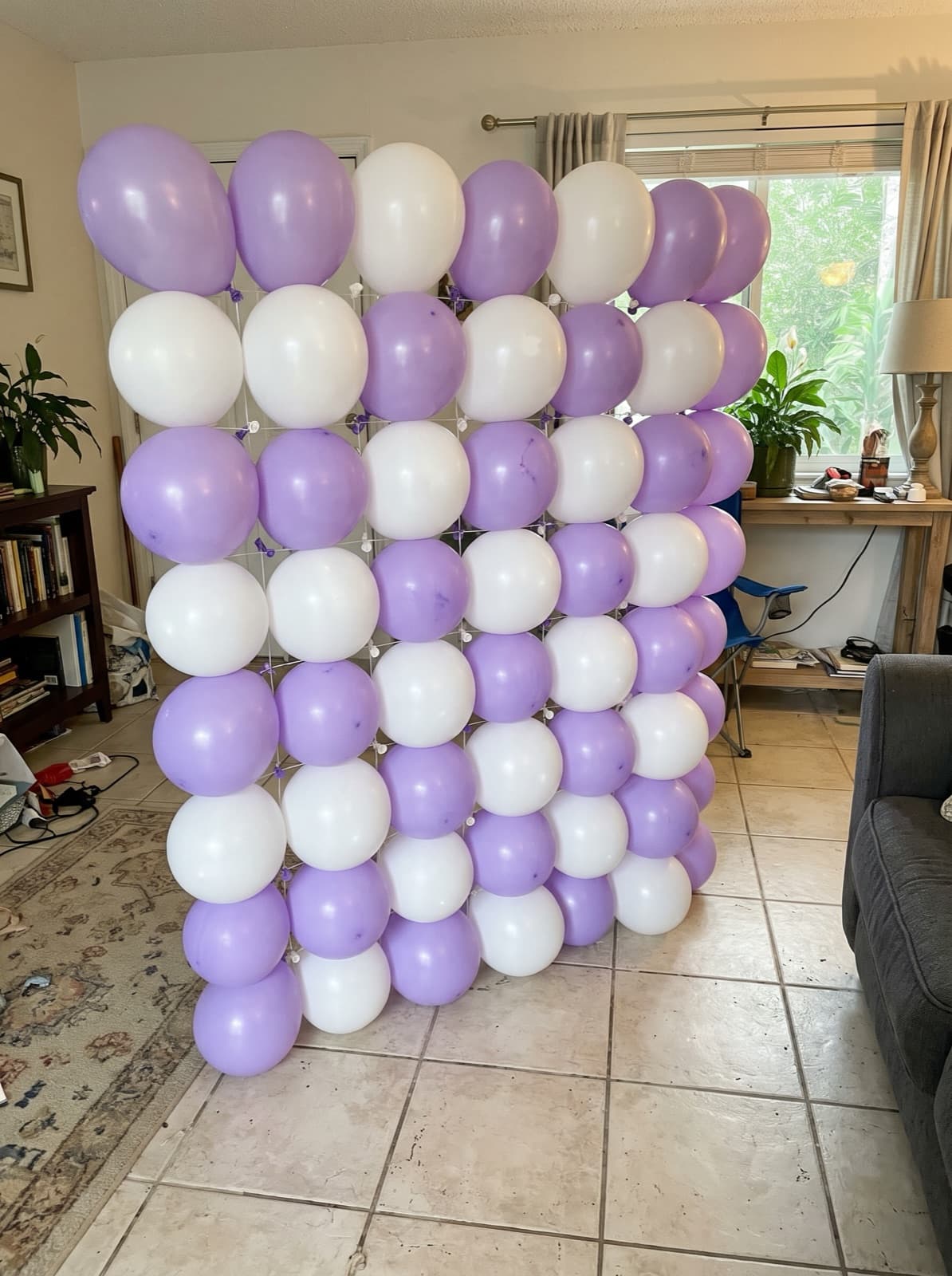 Grid balloon wall in a lavender and white checkerboard